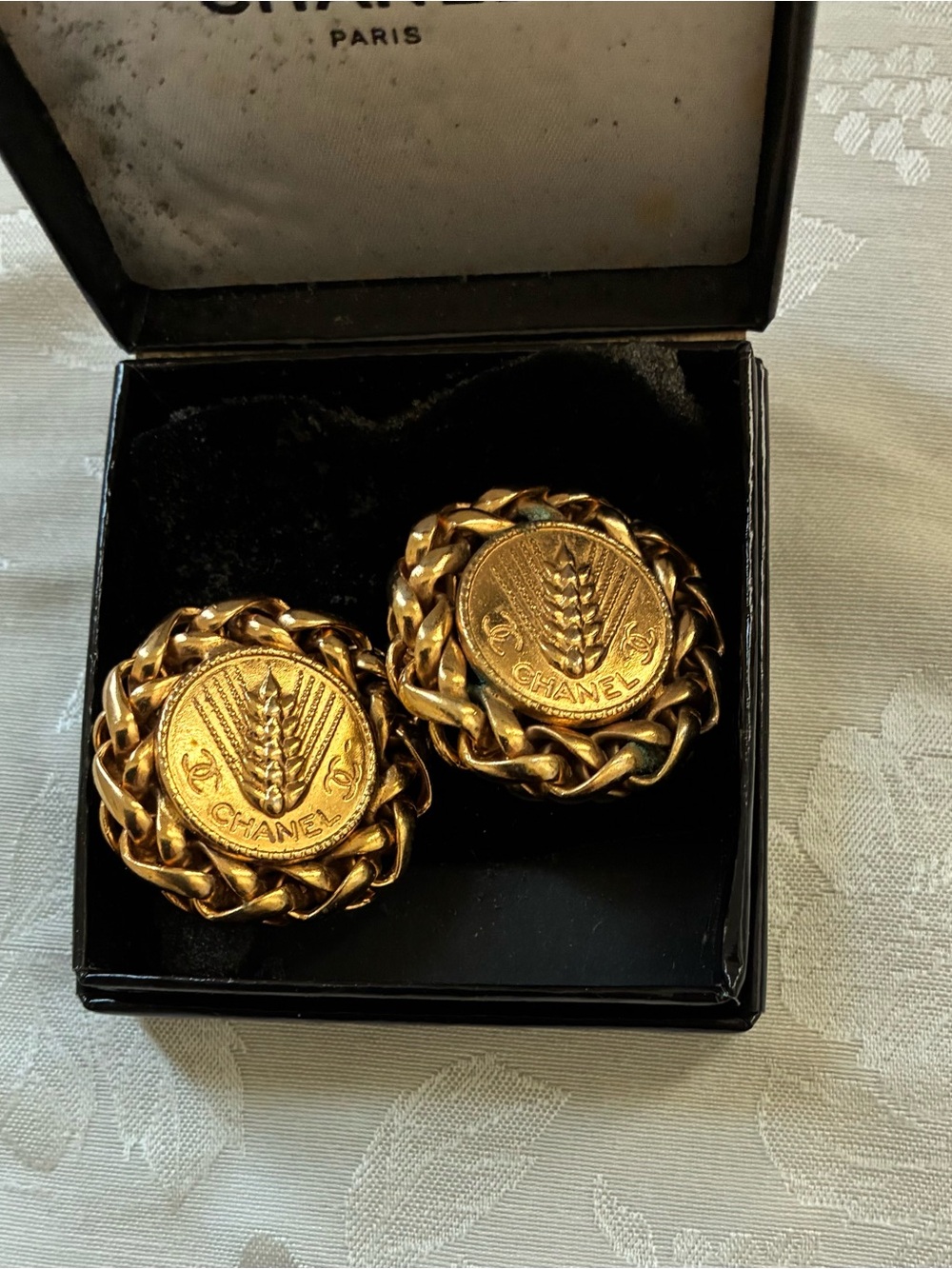Vintage CHANEL Gold Tone Woven Medallion Clip-On Earrings